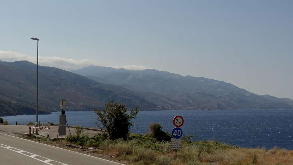 Strong Bura foehn wind and clouds over Velebit, seen from Senj
