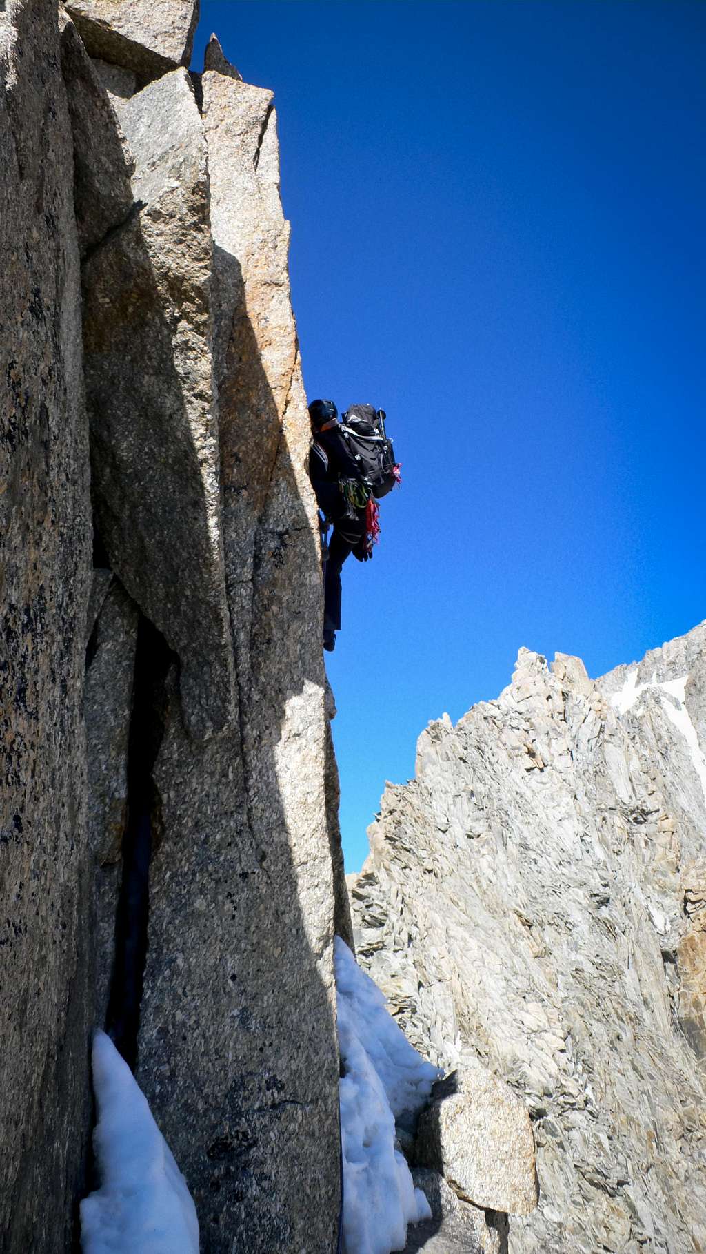 Georg on a steep, snowy wall