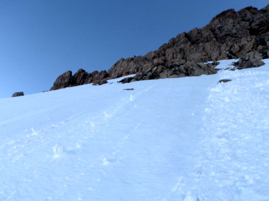 Snow climbing below rock pitch