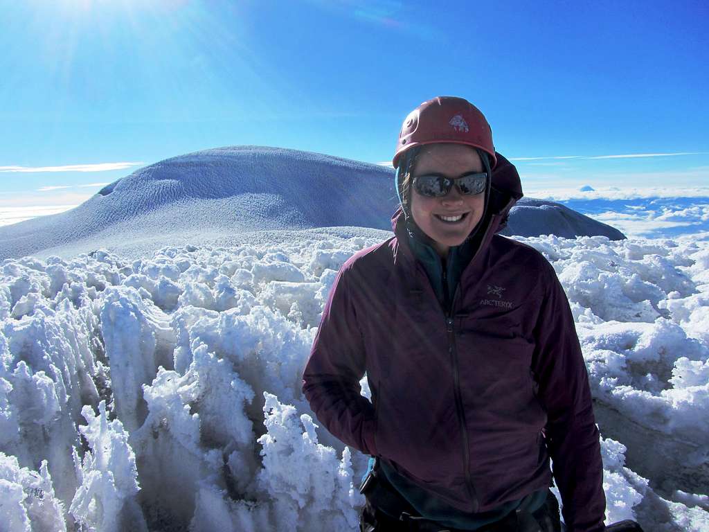Me with the summit of Chimborazo in the background