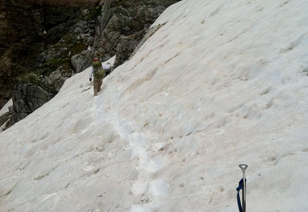 Crossing a snowfield on the East Face of Teewinot