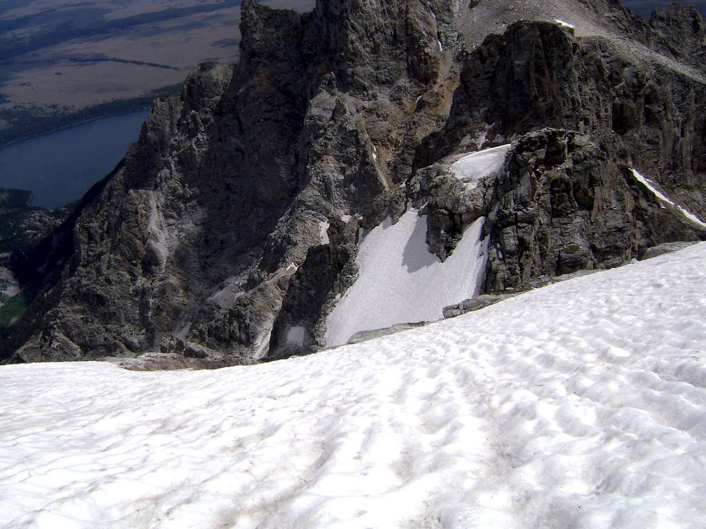 Steep snow leading to cliffs-High on the Koven route of Mount Owen