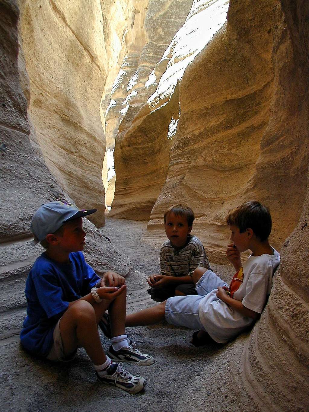 Boys playing inside the canyon
