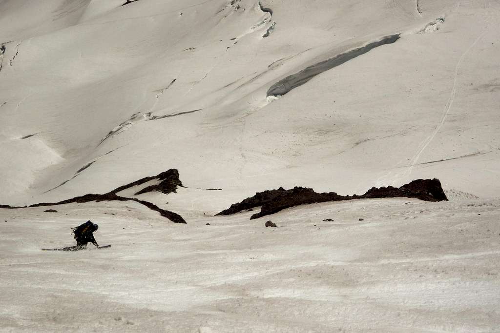 CJ Whittacker skiing toward the Wilson Glacier