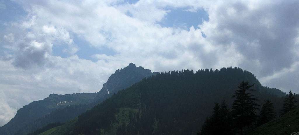 Panorama of the Drei Schwestern (2052m), with the forrested slopes of the Frastanzer Sand in the foreground on the right