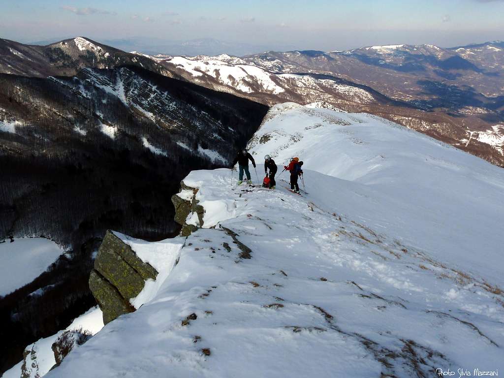 Ski mountaineers on Roccabiasca summit ridge