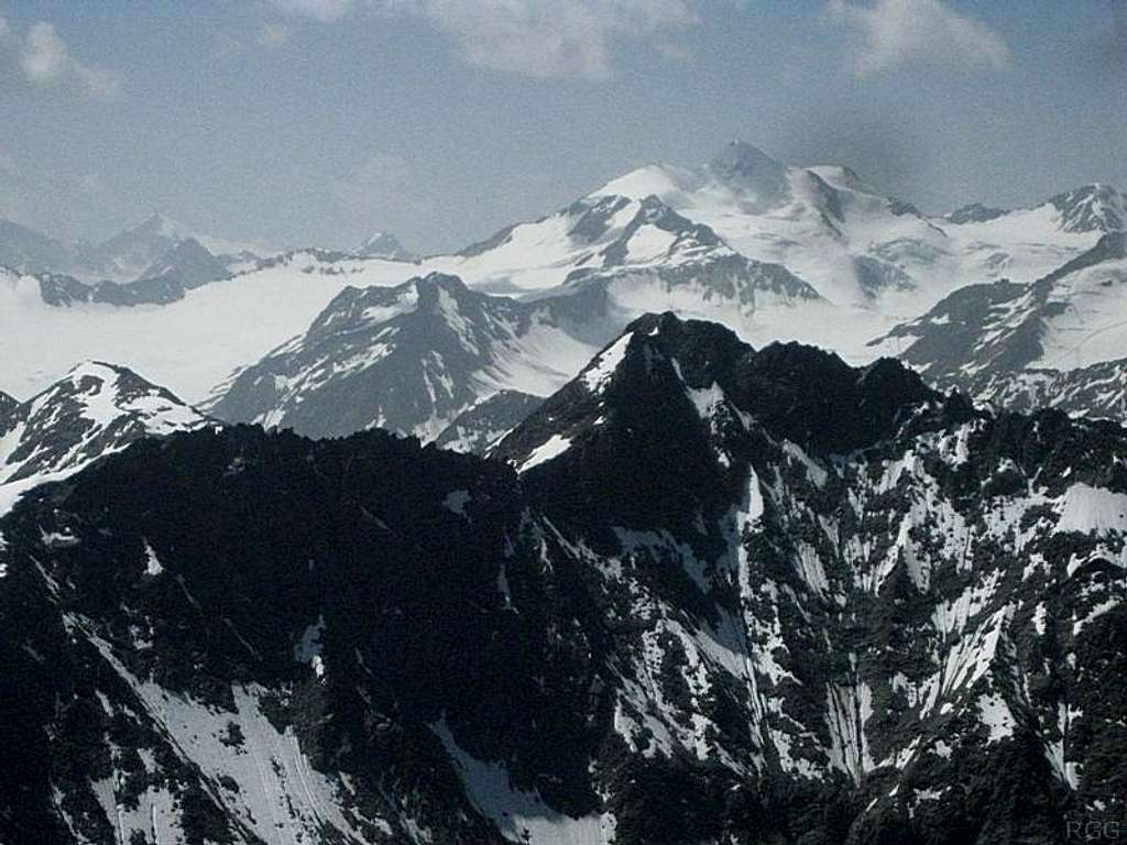 A distant Wildspitze (3768m) above the Puitkogel (3345m), from Hohe Geige (3395m)