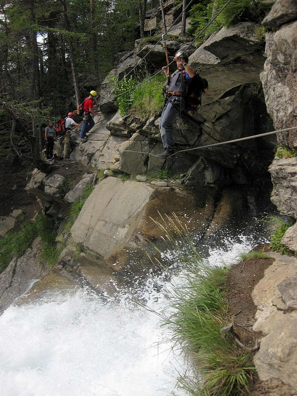 Crossing the falls on the Stuibenfall Via Ferrata