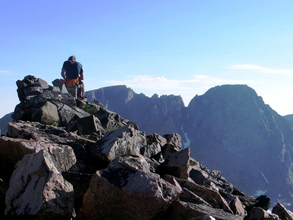 Matt on the summit of Villard with the Granite Traverse behind