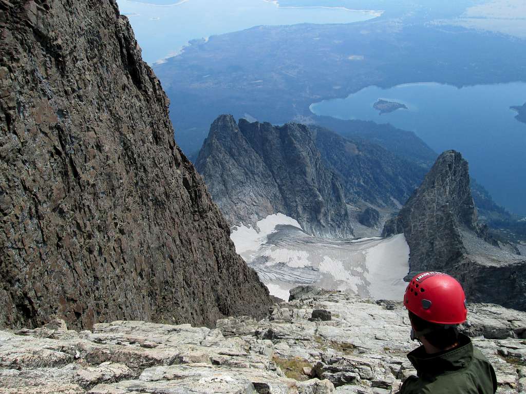 JD looking down the CMC face from near the top of Mount Moran, next to the black dike
