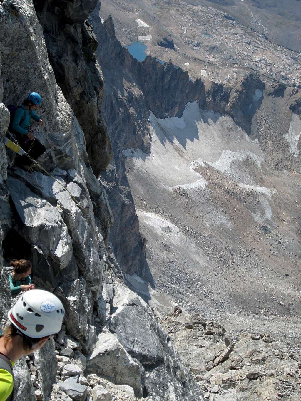 Climbers looking down the OS rappel on the Grand Teton