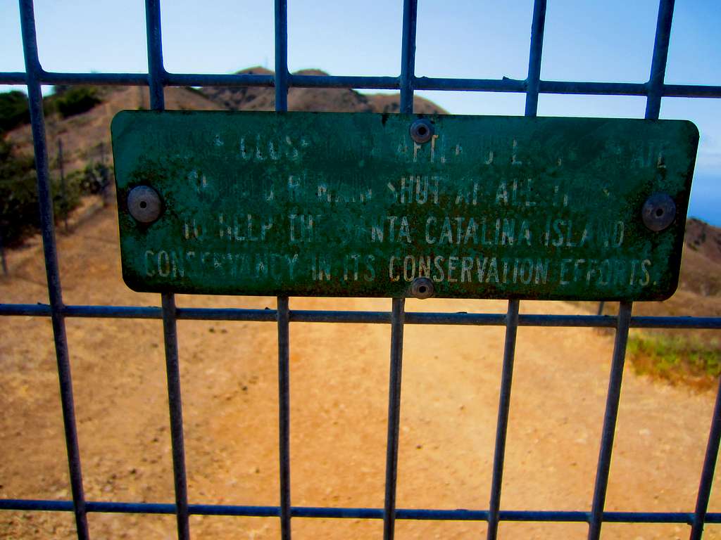 The gate only notes (in worn wording) that the gate needs to be closed - presumably to isolate unwanted species