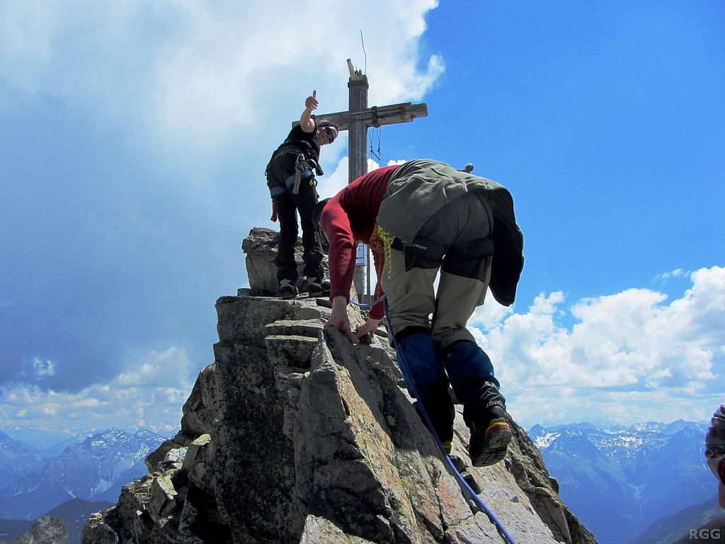 Jannie on top of the Dreiländerspitze with Paul right behind