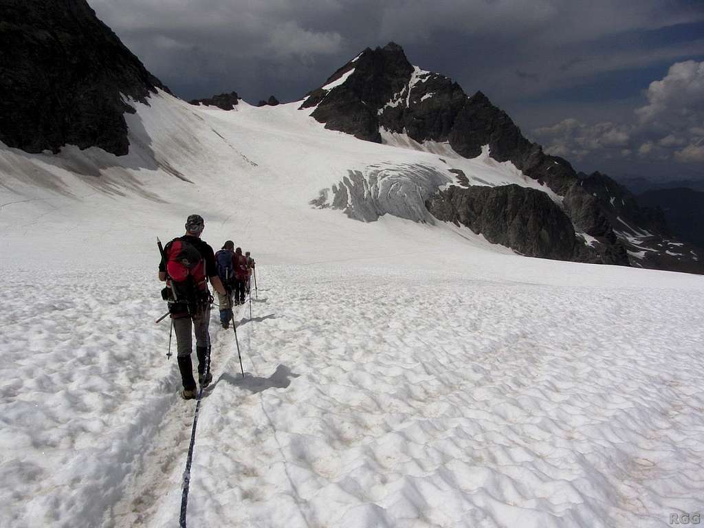 Descending Piz Buin, high on the Ochsental Glacier, with Silvrettahorn in the background