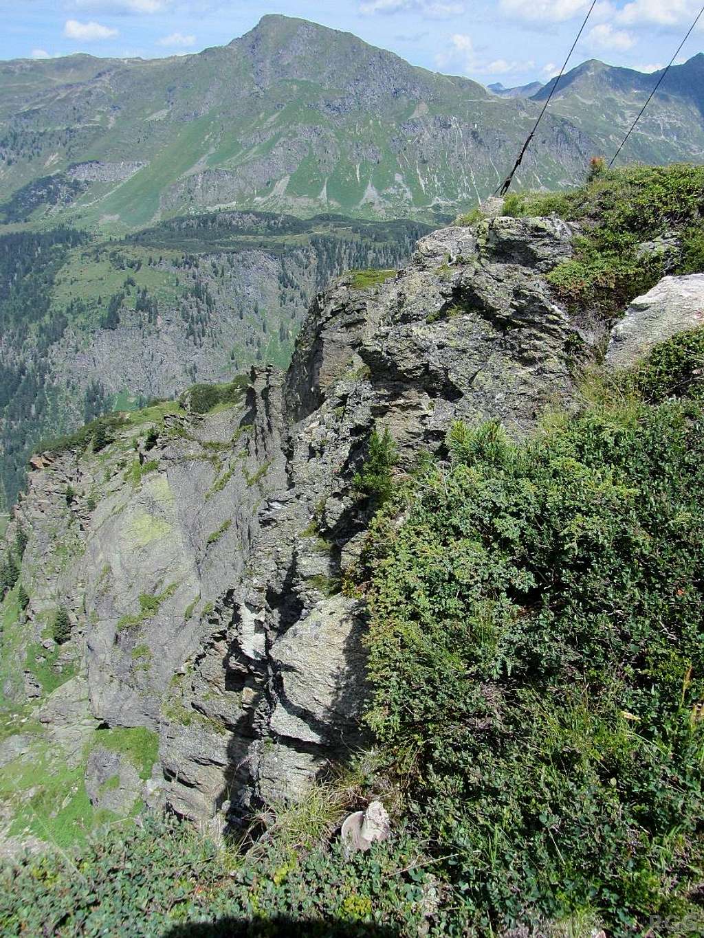 View along the steep west face of the