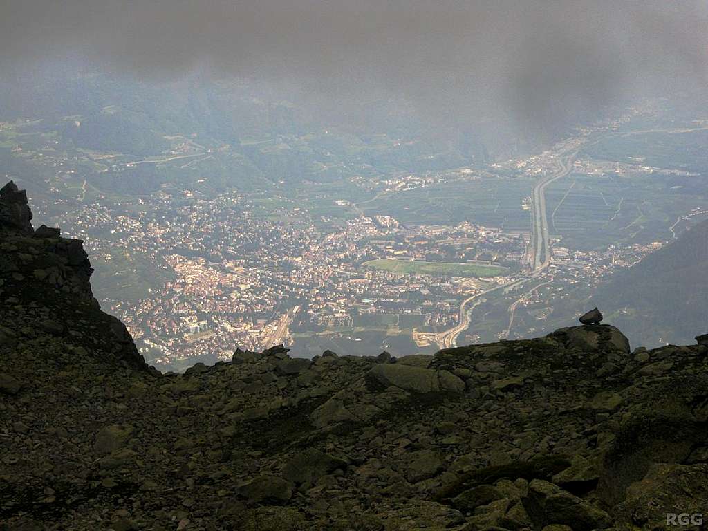 Looking down on Meran from just below the clouds