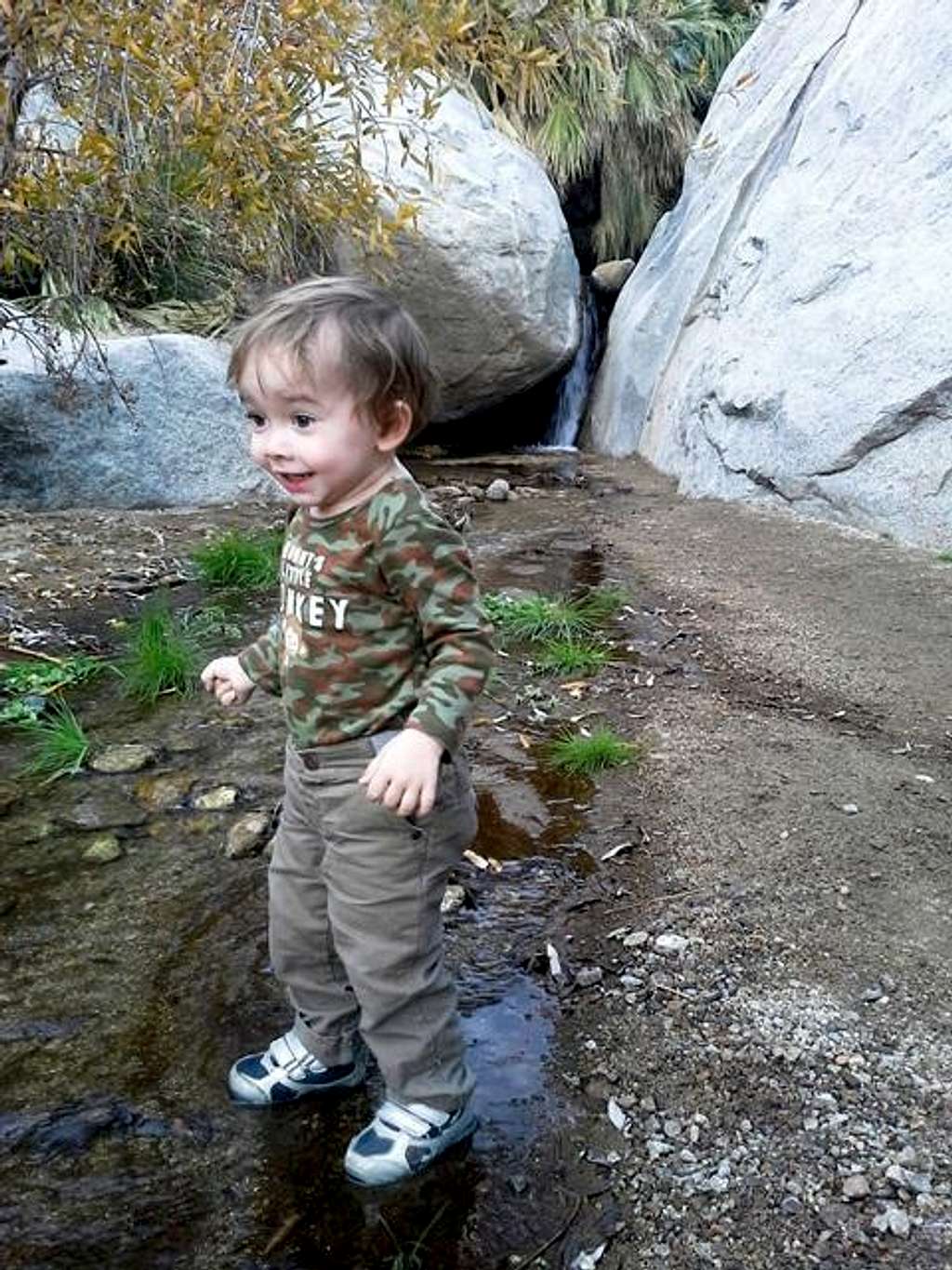 My son at the waterfall