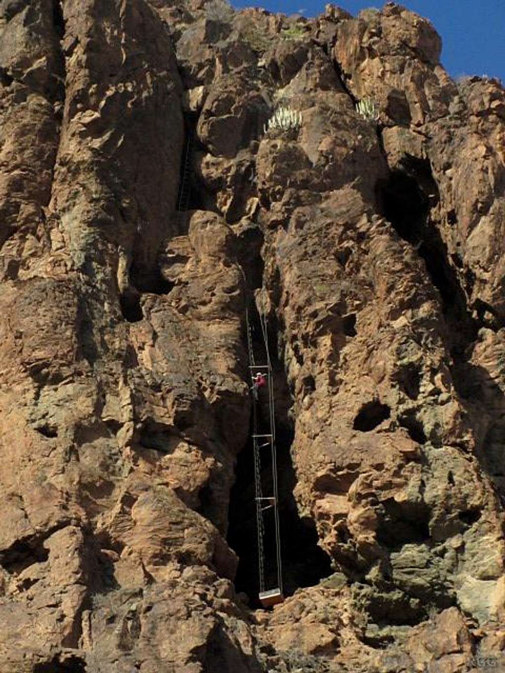 Jan on the ladders on Via Ferrata Jesús Beitia