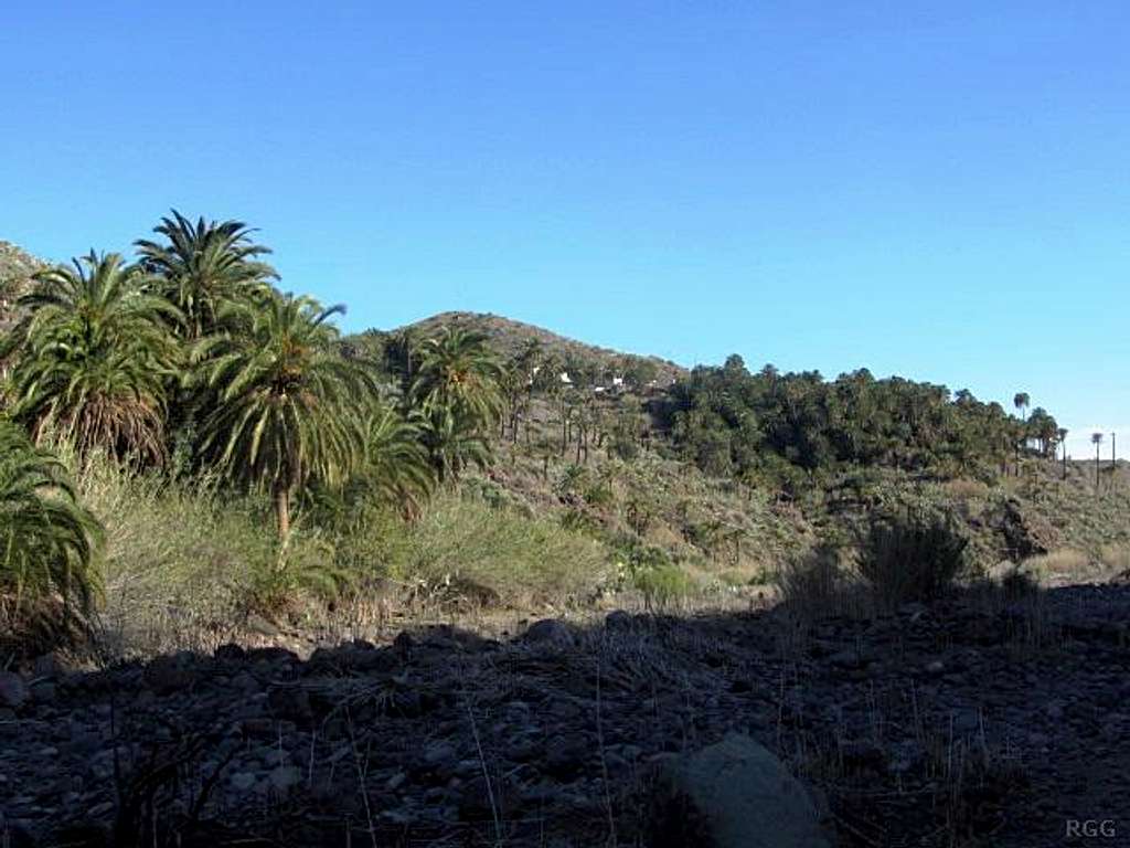 Looking up at the village of Sorrueda from the entrance to the canyon