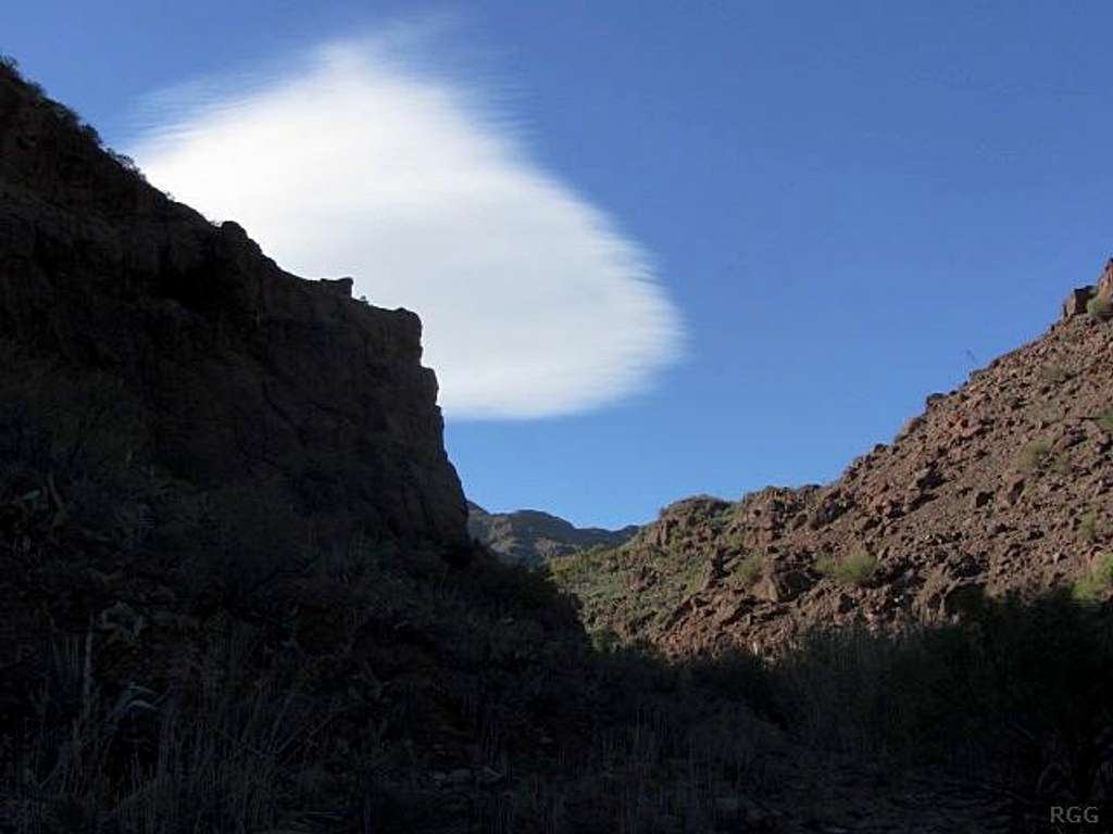 Funny cloud hovering above the rocks at Sorrueda