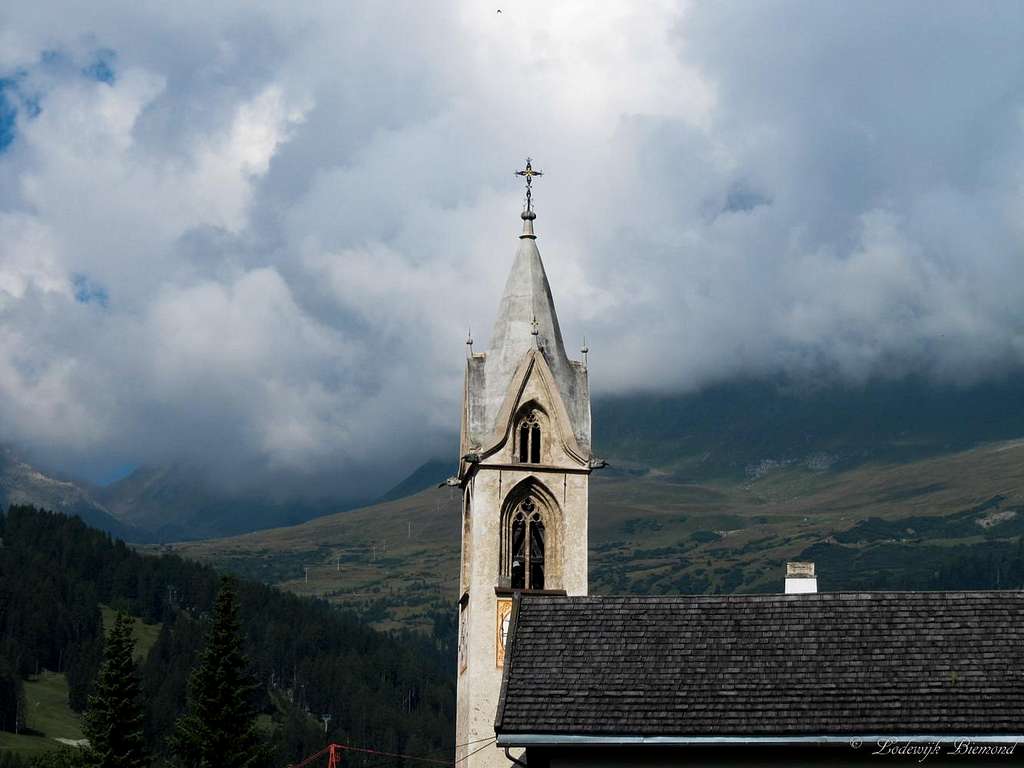 Serfauser Church with Furgler in the Clouds