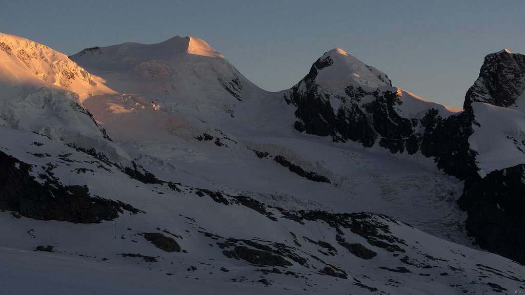 Alpenglow on Castor and Pollux