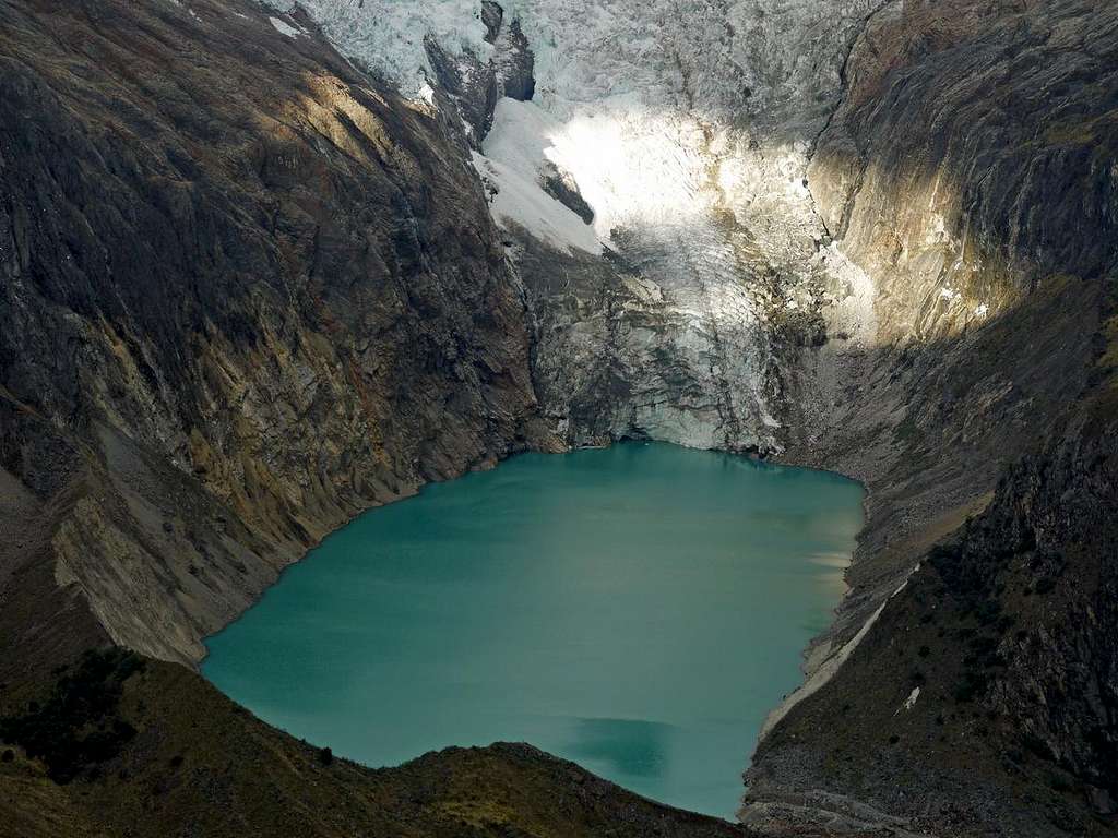 Lake Arhuaycocha with a Glacier Above