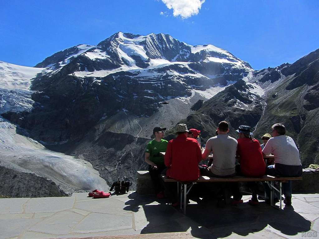 On the terrace of the Turtmannhütte, with Les Diablons dominating the show