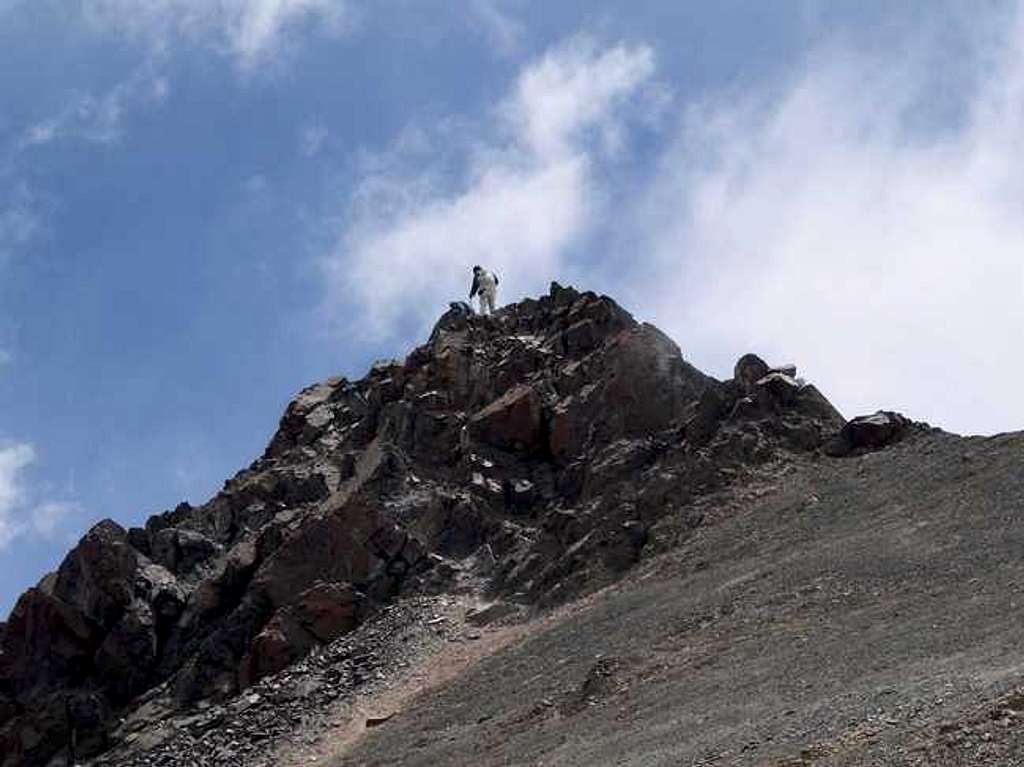 Climber on the summit rocks...