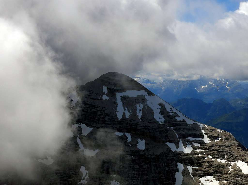 Clouds begin to hide the summit of Tofana di Rozes