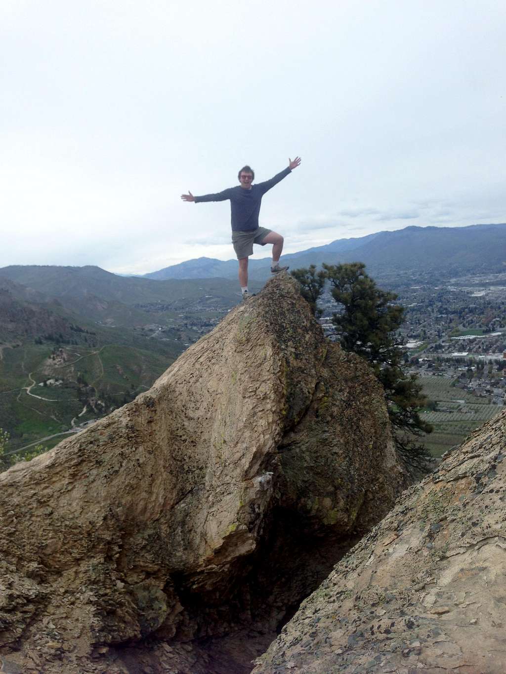 Josh Lewis on top of the rock