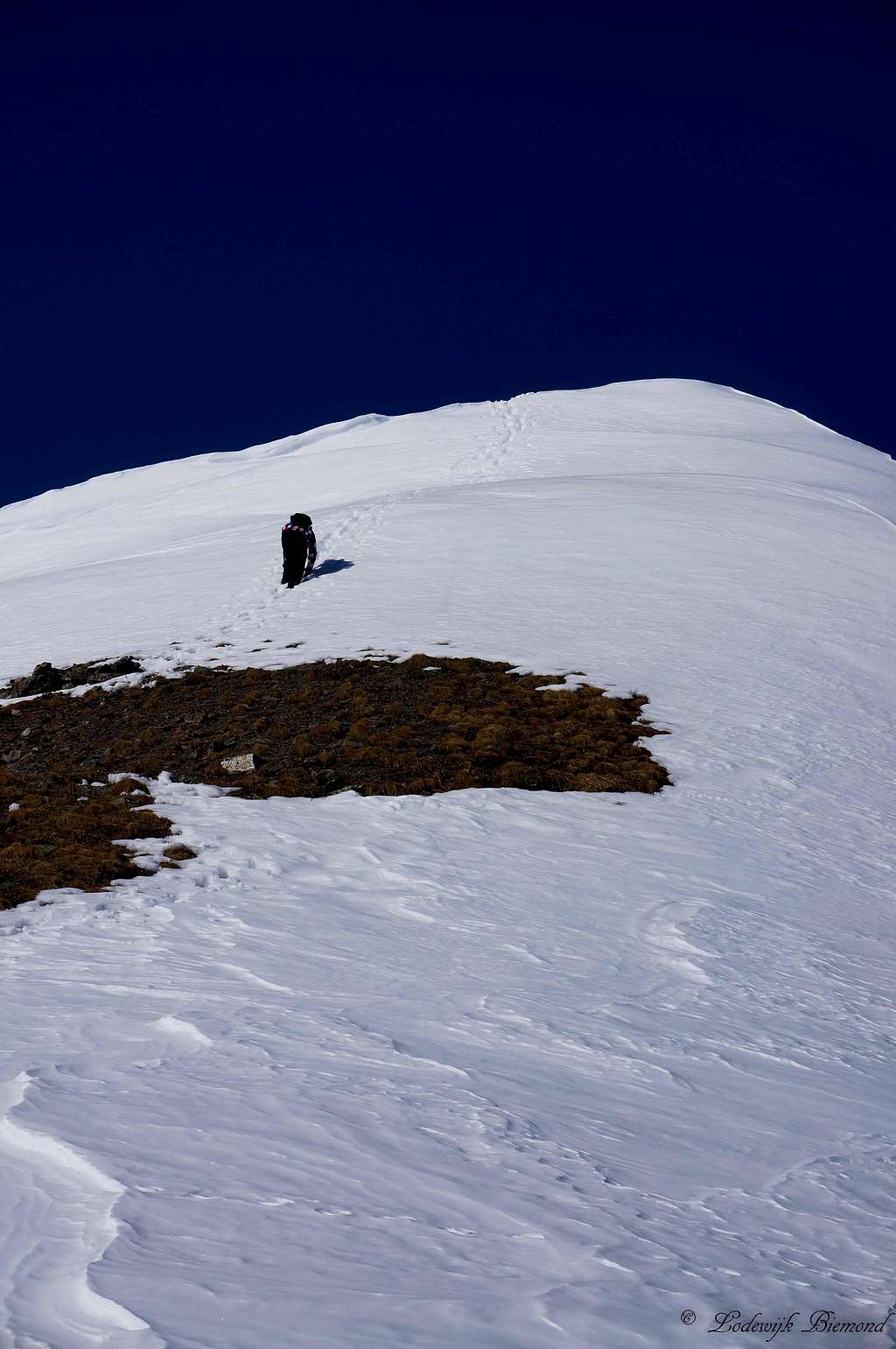 Ron climbing near the summit