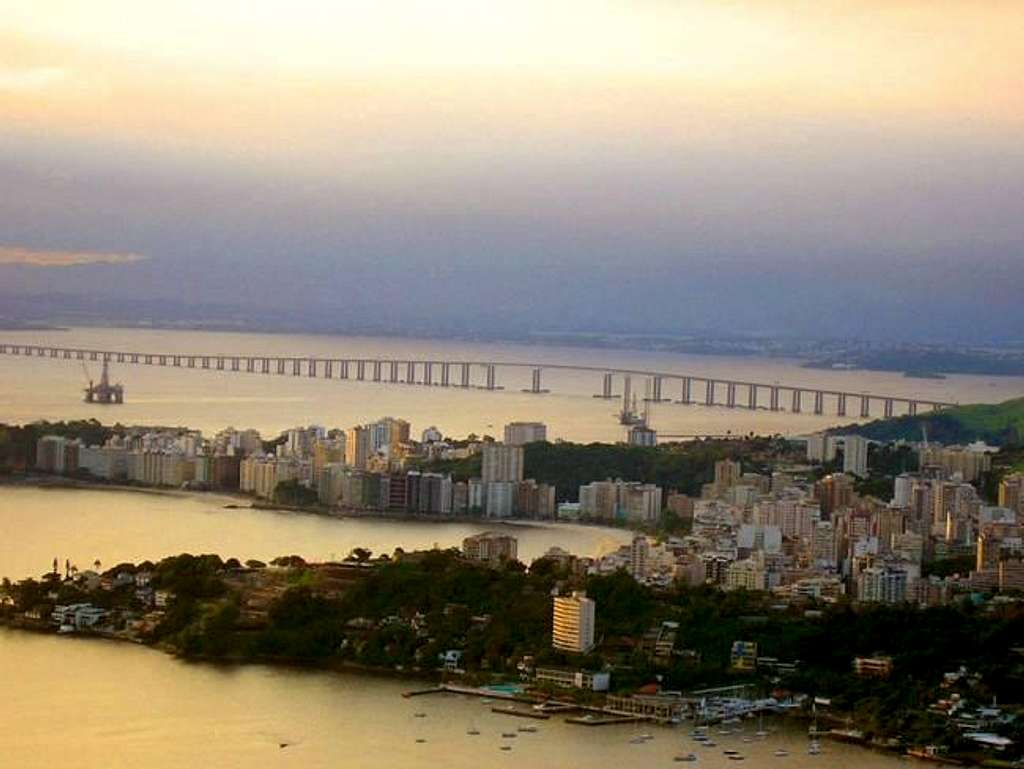 At back, Rio-Niterói Bridge...