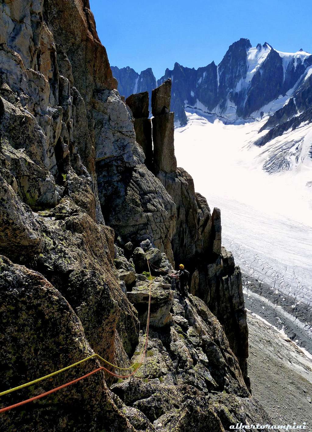 Downclimbing from the summit of Aiguille du Refuge