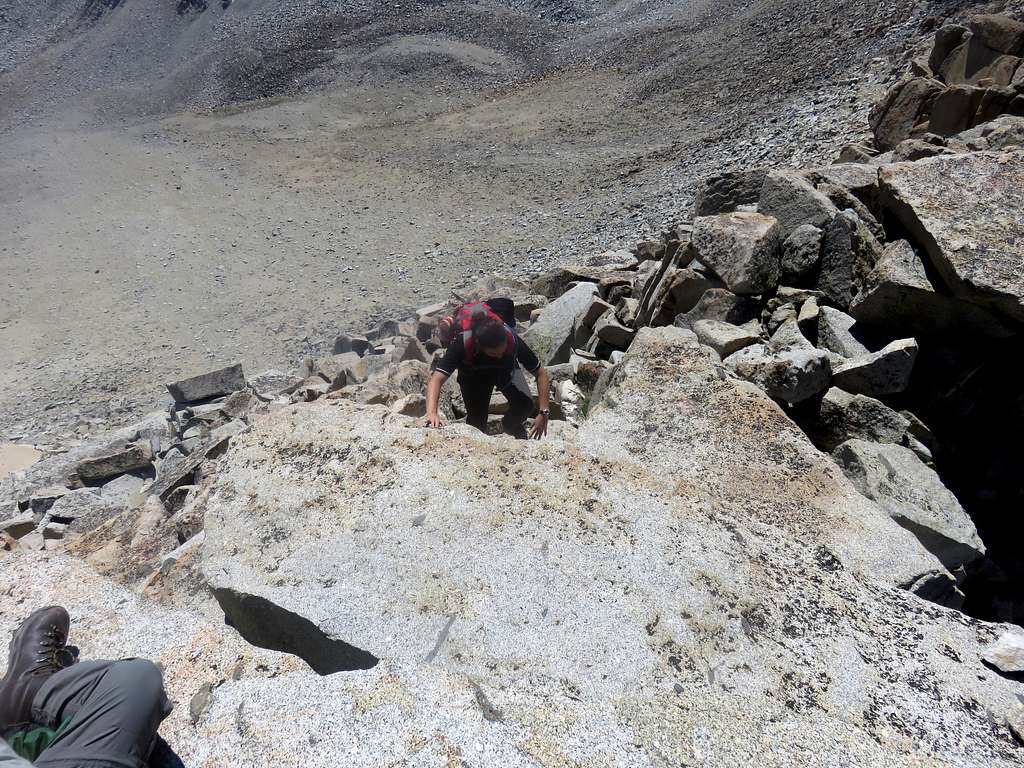 Climbing the final feet to the summit