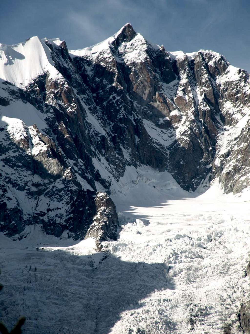 Angry Mont Maudit begins to vent downstream ice 2015