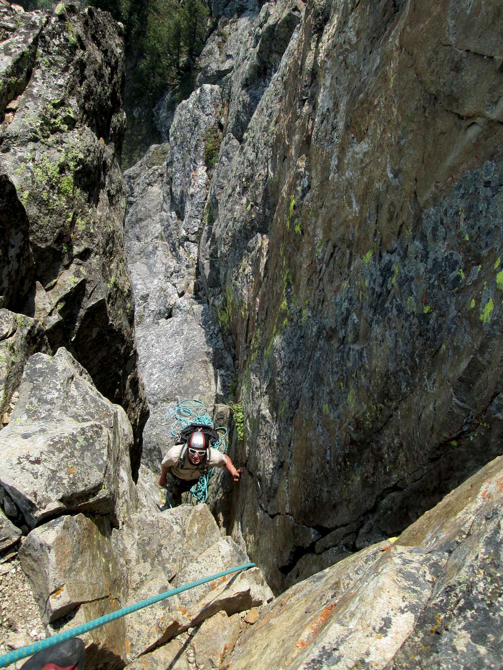 Looking down the chimney on pitch 4 of the South Ridge/Face of Baxter's Pinnacle, Teton Range, WY