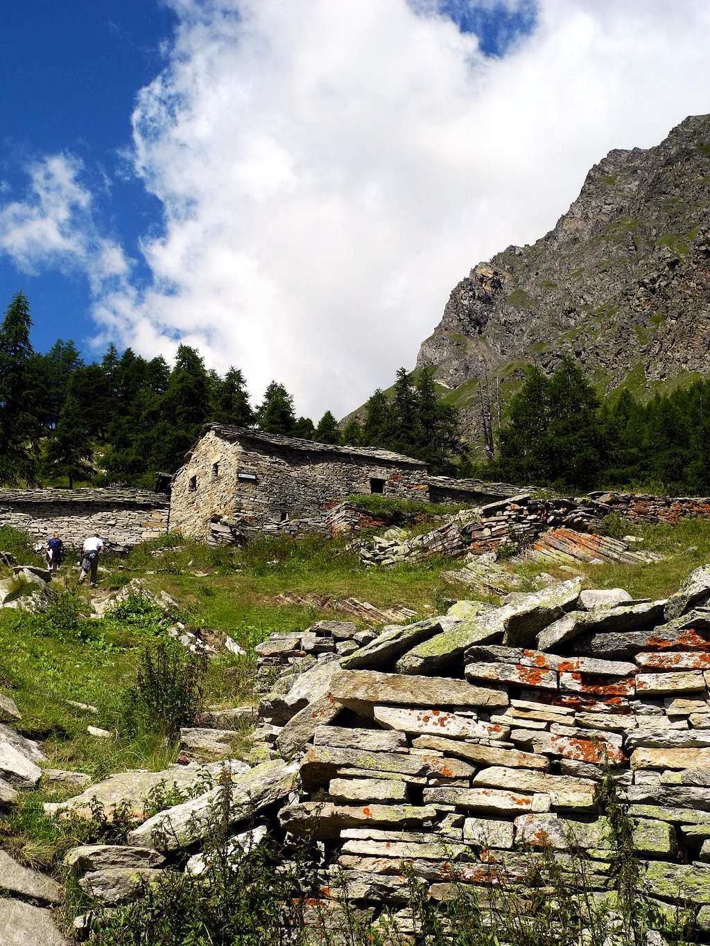 Ancient mountain alm on the way to Refuge Vittorio Sella