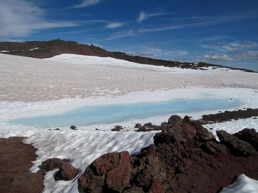 blue snowpool on summit