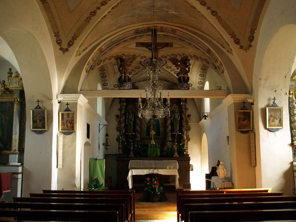 Altar and crucifix inside Parish Church of Lignan 2015