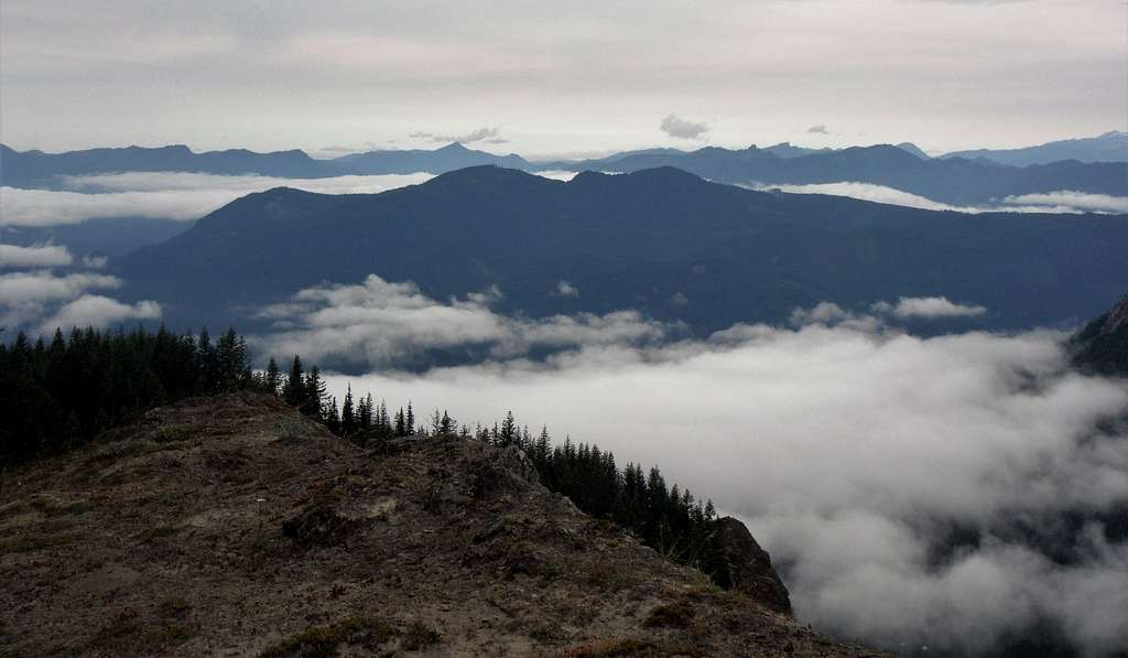 Looking over the clouds and peak