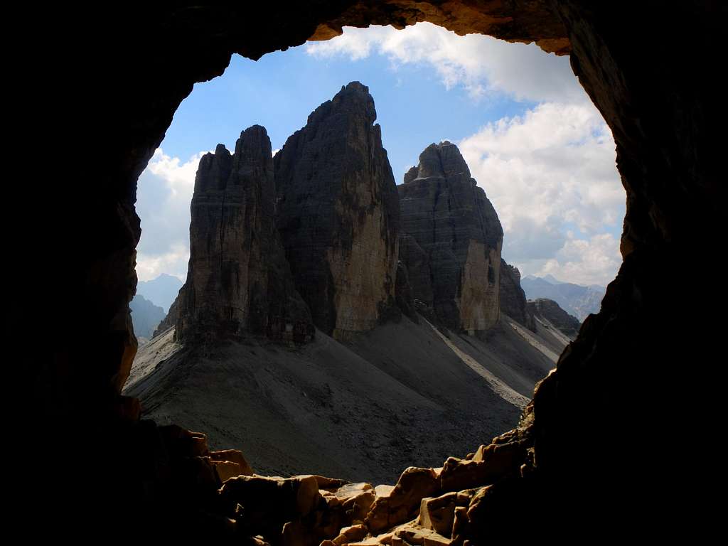 Tre Cime di Lavaredo seen from a cave on Paterno Normal descent