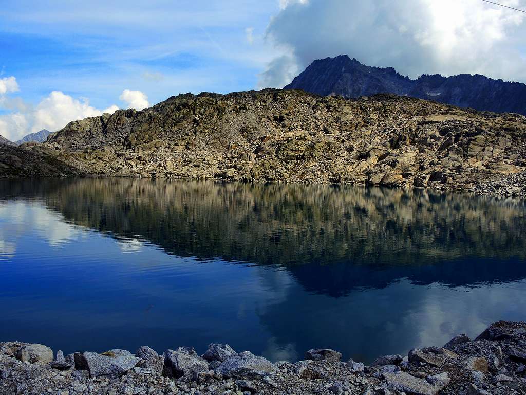 Small alpine lake near Passo del Paradiso