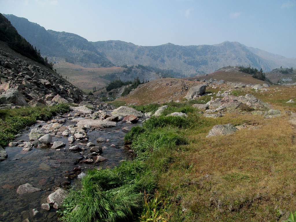 a creek midway towards the SW ridge