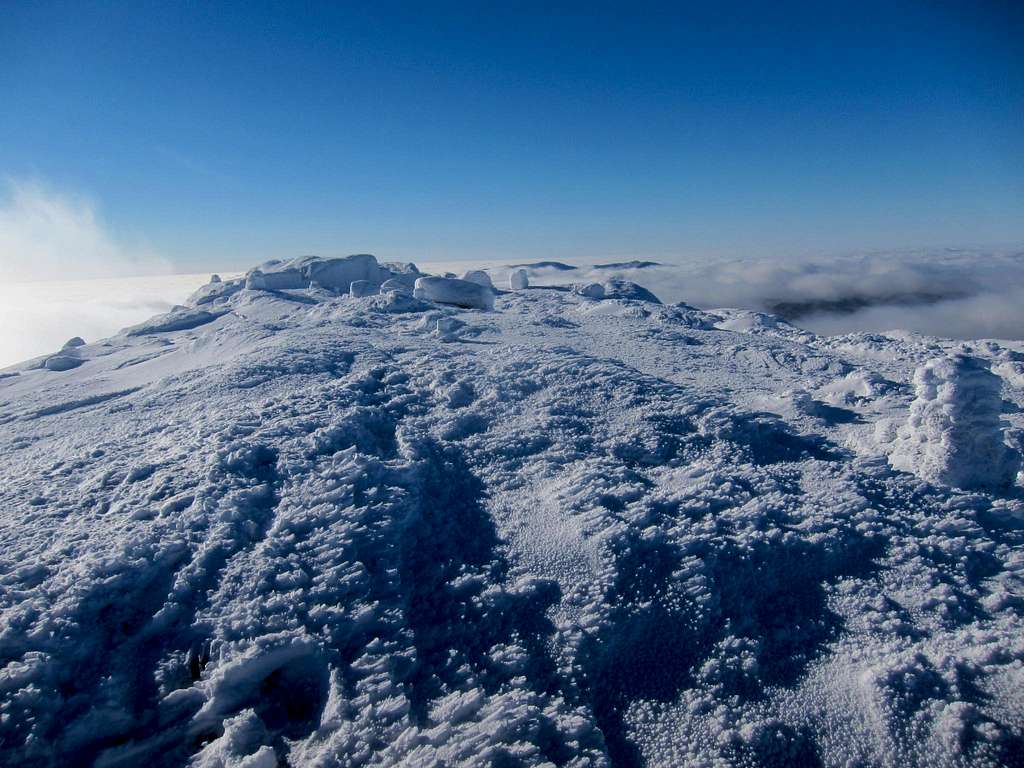 Thin snow on summit