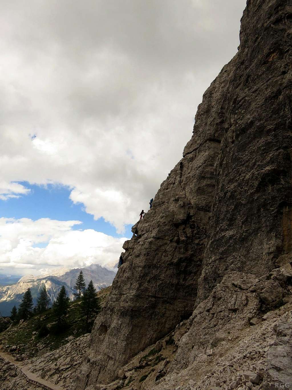 Despite the less than favorable skies, climbers are still heading up Torre Lusy