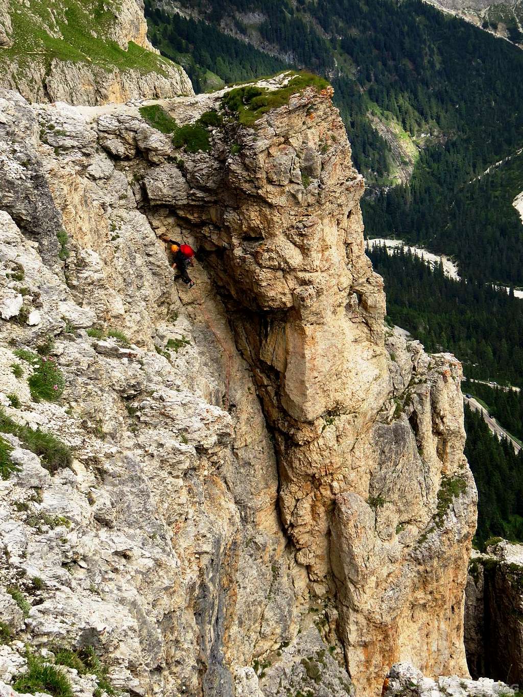 A climber high on the Trenker Crack route, 1st Sella Tower