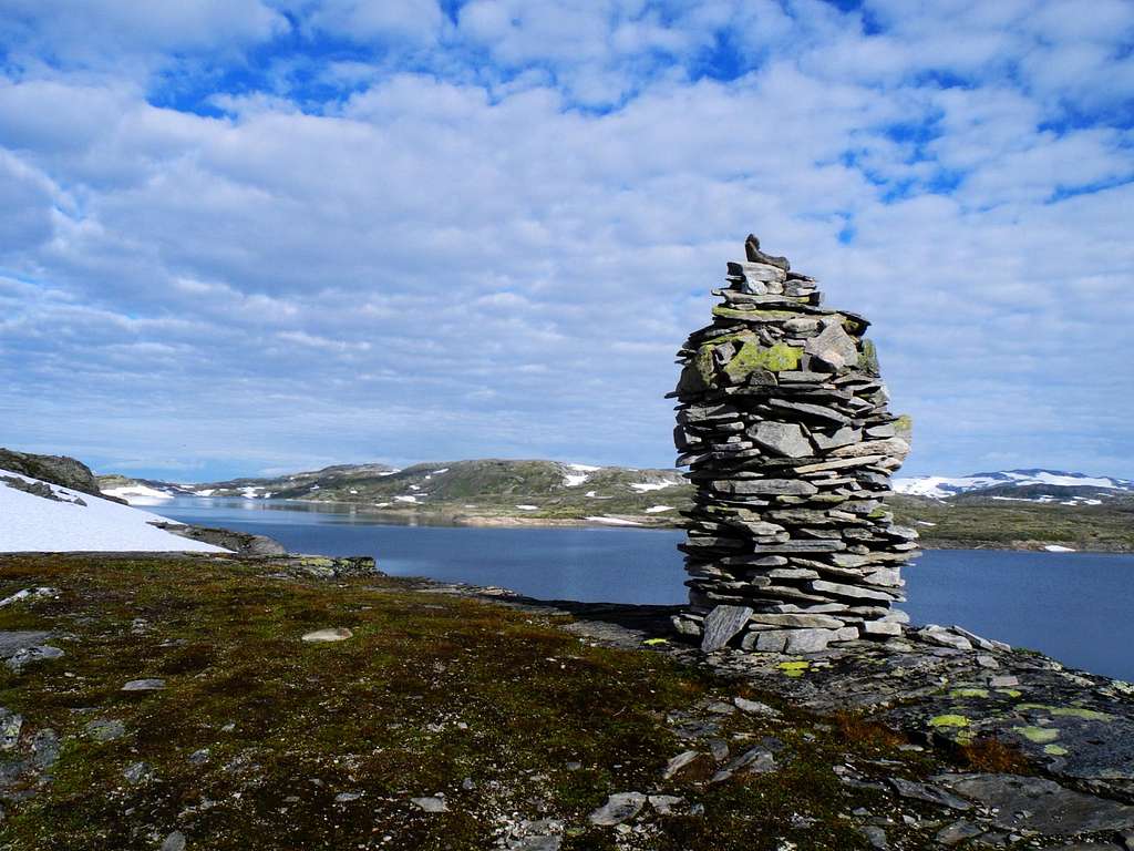 Big cairn on Prestesteinvatnet lake shore