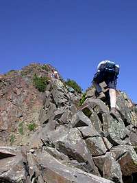 The ridge is steep, rocky,...