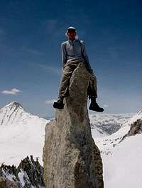 Matthew sits atop the summit...